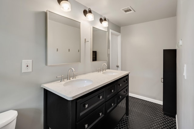 3218 Joffre Ave, Memphis, TN 38111 - full bathroom with double vanity and toilet