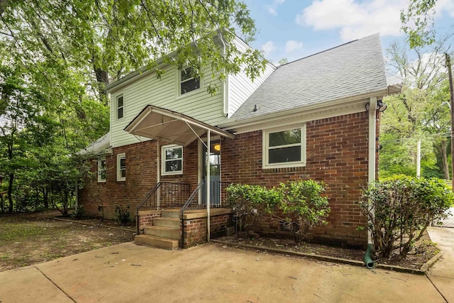 3218 Joffre Ave, Memphis, TN 38111 - view of front of house with a shingled roof and brick siding