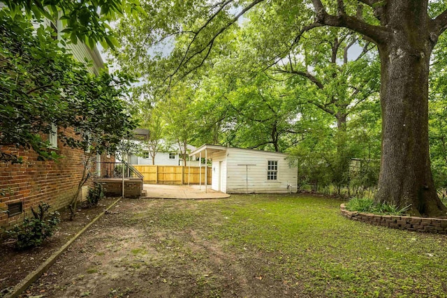 3218 Joffre Ave, Memphis, TN 38111 - view of yard featuring an outbuilding and a patio area
