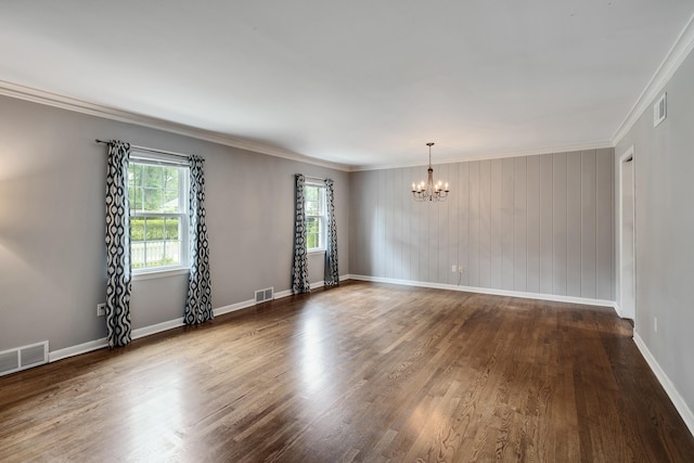 3218 Joffre Ave, Memphis, TN 38111 - empty room with a chandelier, wood finished floors, and crown molding
