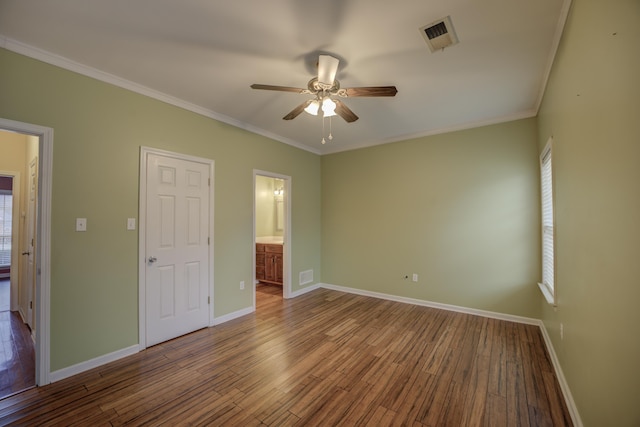 6384 Acree Woods Dr, Olive Branch, MS 38654 - unfurnished bedroom featuring wood finished floors, crown molding, connected bathroom, and ceiling fan