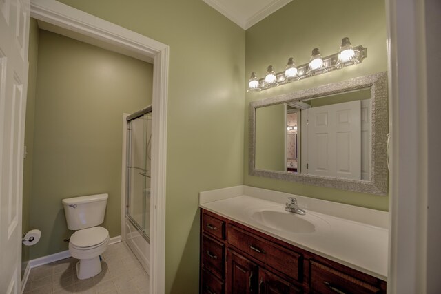 6384 Acree Woods Dr, Olive Branch, MS 38654 - bathroom with ornamental molding, vanity, tile patterned floors, and enclosed tub / shower combo
