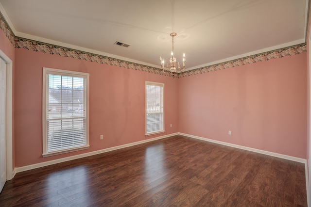6384 Acree Woods Dr, Olive Branch, MS 38654 - empty room featuring a chandelier, healthy amount of natural light, dark wood-type flooring, and ornamental molding