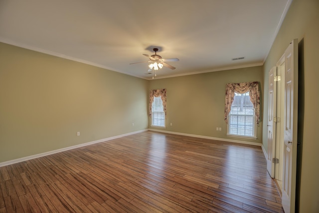 6384 Acree Woods Dr, Olive Branch, MS 38654 - unfurnished room with plenty of natural light, a ceiling fan, wood finished floors, and crown molding