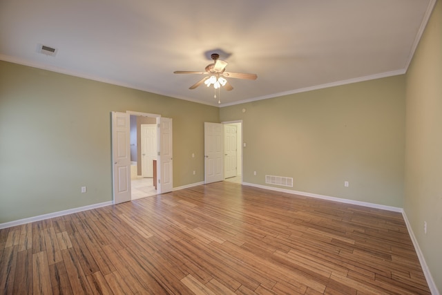 6384 Acree Woods Dr, Olive Branch, MS 38654 - empty room with a ceiling fan, light wood-type flooring, and crown molding