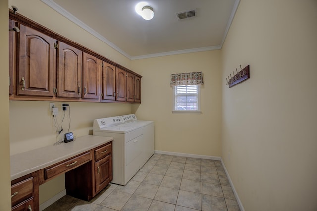 6384 Acree Woods Dr, Olive Branch, MS 38654 - laundry area featuring cabinet space, ornamental molding, washer and dryer, a desk, and light tile patterned floors