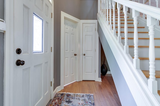 1501 Granville Ln, Memphis, TN 38104 - foyer with light wood-style floors and stairs