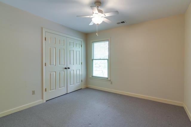 1501 Granville Ln, Memphis, TN 38104 - unfurnished bedroom featuring light colored carpet, a closet, and ceiling fan
