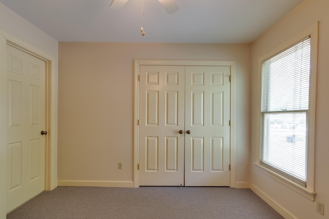 1501 Granville Ln, Memphis, TN 38104 - unfurnished bedroom with light colored carpet, a closet, and ceiling fan
