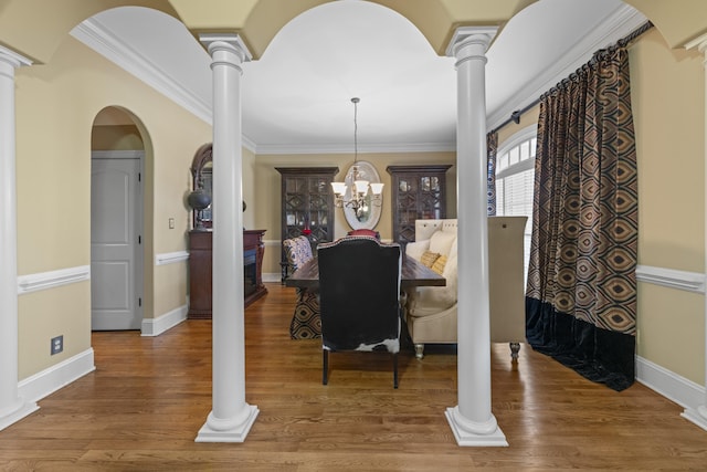 11095 Latting Rd, Eads, TN 38028 - dining space featuring ornate columns, wood finished floors, a chandelier, and crown molding