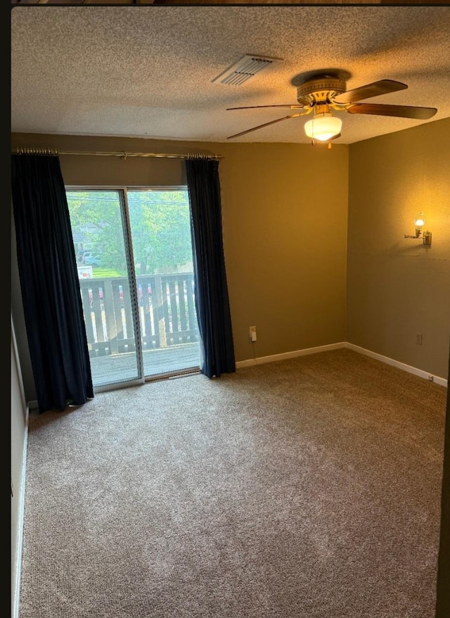 4779 Towering Oaks Dr Unit 704, Memphis, TN 38117 - carpeted spare room with a ceiling fan and a textured ceiling