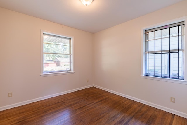 1539 Eason Ave, Memphis, TN 38116 - spare room with dark wood-style floors and baseboards