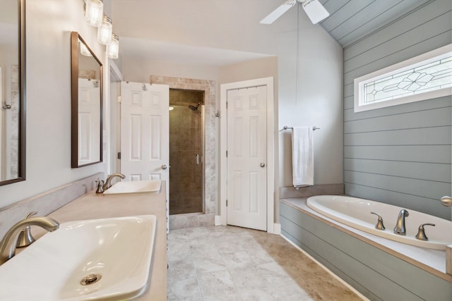 1231 Pinnacle Point Dr, Collierville, TN 38017 - bathroom featuring a garden tub, a stall shower, ceiling fan, double vanity, and vaulted ceiling