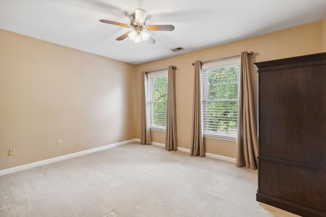 1231 Pinnacle Point Dr, Collierville, TN 38017 - empty room featuring a ceiling fan and light colored carpet