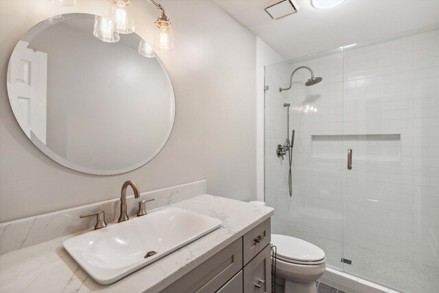 1231 Pinnacle Point Dr, Collierville, TN 38017 - bathroom featuring a stall shower and vanity