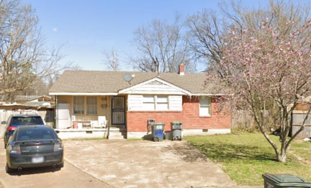 1100 Danita Cv, Memphis, TN 38122 - view of front facade with a porch, brick siding, and a chimney