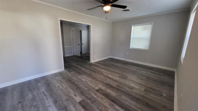 3499 Rockwood Ave, Memphis, TN 38122 - empty room featuring ornamental molding, ceiling fan, and dark wood-type flooring