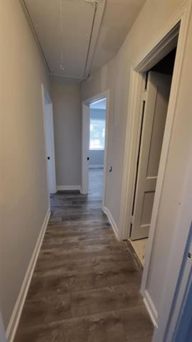 3499 Rockwood Ave, Memphis, TN 38122 - corridor featuring attic access and dark wood-style flooring