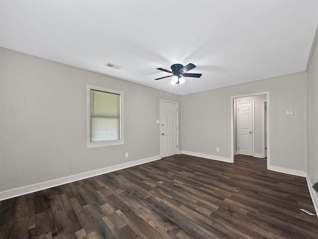 1644 N Graham St, Memphis, TN 38108 - spare room featuring dark wood finished floors and a ceiling fan