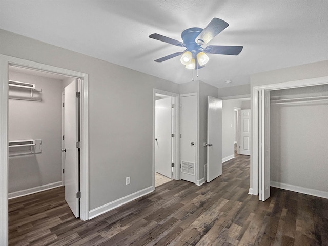 1644 N Graham St, Memphis, TN 38108 - unfurnished bedroom featuring dark wood-type flooring, ceiling fan, and a closet