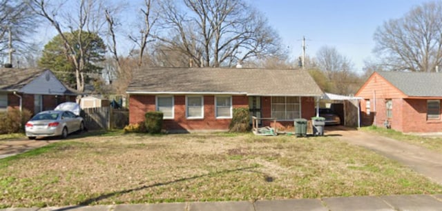 4678 Given Ave, Memphis, TN 38122 - single story home featuring driveway, a front lawn, and a carport