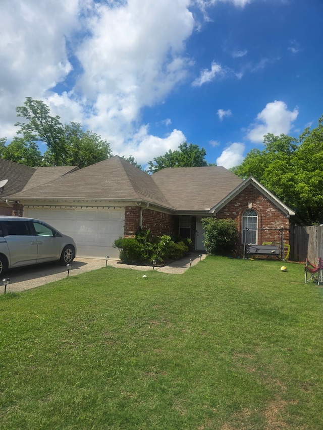 4568 Perkins Grove Cv, Memphis, TN 38122 - single story home with an attached garage, brick siding, and driveway