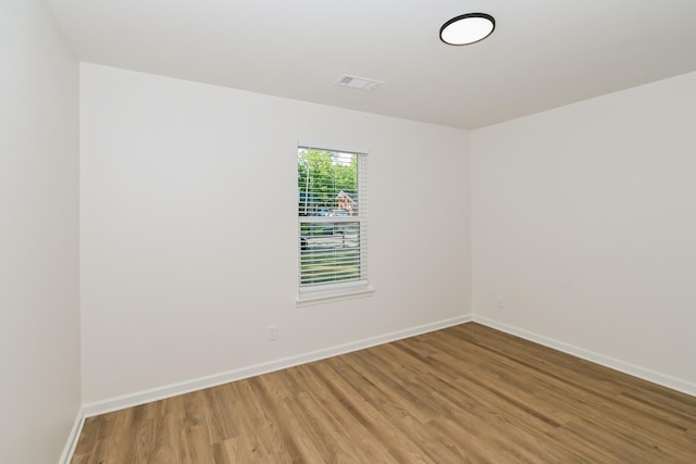 4130 Cottonwood Rd, Memphis, TN 38118 - spare room featuring light wood-style flooring and baseboards
