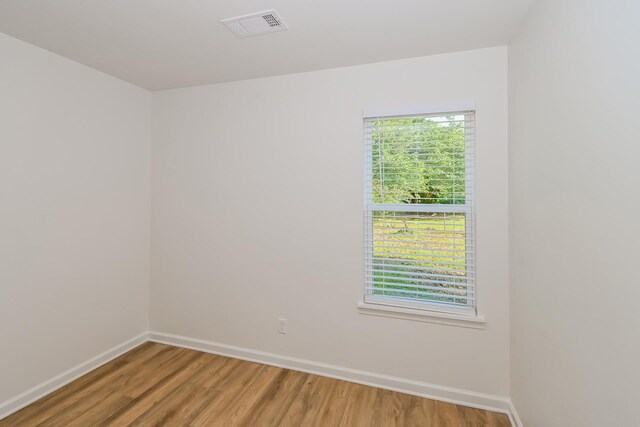 4130 Cottonwood Rd, Memphis, TN 38118 - unfurnished room featuring baseboards and wood finished floors