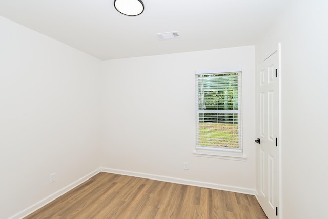 4130 Cottonwood Rd, Memphis, TN 38118 - empty room with wood finished floors and baseboards