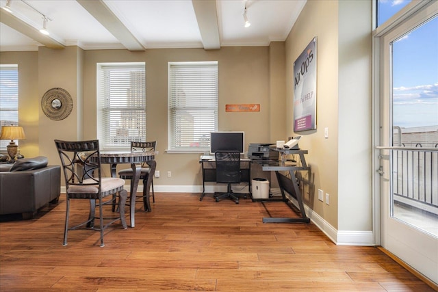 127 Madison Ave Unit 602, Memphis, TN 38103 - office area featuring track lighting, light wood-style flooring, crown molding, and beamed ceiling