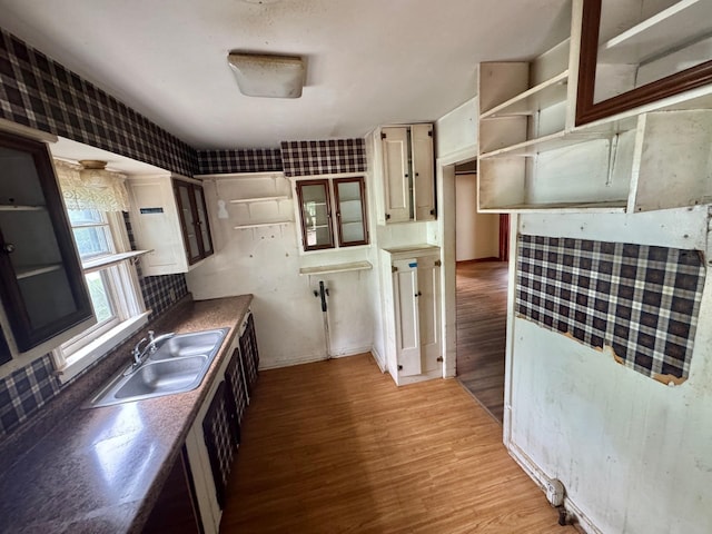 1445 Depass St, Memphis, TN 38122 - kitchen featuring light wood finished floors and open shelves