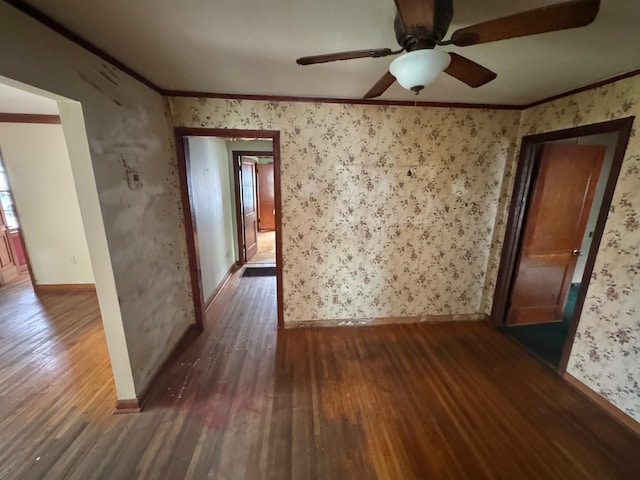 1445 Depass St, Memphis, TN 38122 - unfurnished room with wood finished floors, crown molding, a ceiling fan, and wallpapered walls