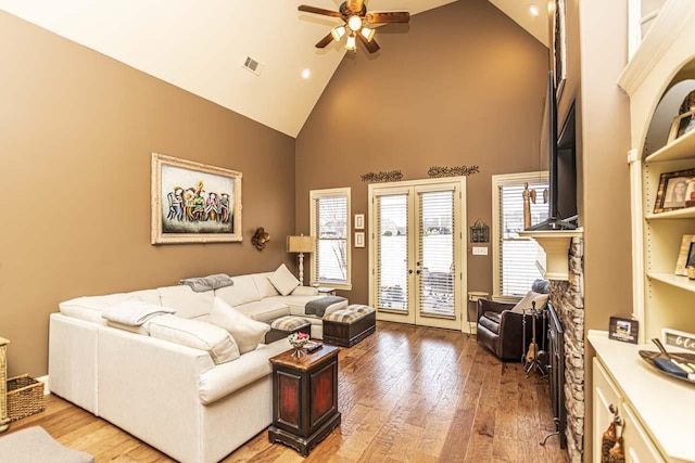 190 Links View Dr, Oakland, TN 38060 - living room with high vaulted ceiling, ceiling fan, light wood-type flooring, and french doors