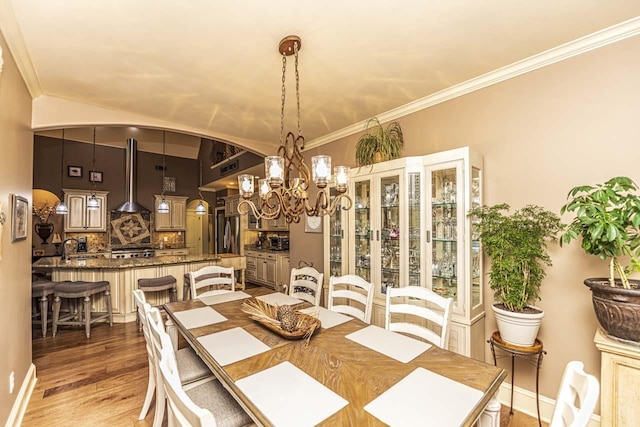 190 Links View Dr, Oakland, TN 38060 - dining area with a chandelier, light wood-style flooring, and ornamental molding
