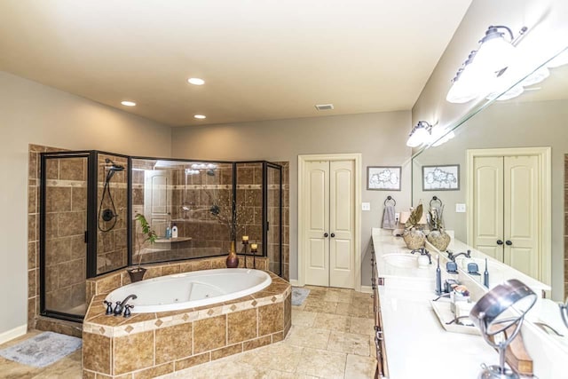 190 Links View Dr, Oakland, TN 38060 - bathroom with a whirlpool tub, double vanity, a stall shower, and recessed lighting