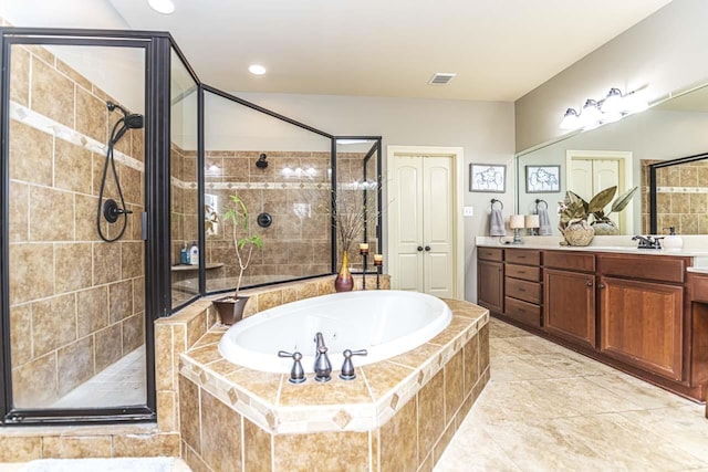 190 Links View Dr, Oakland, TN 38060 - full bath with a garden tub, a stall shower, double vanity, tile patterned flooring, and recessed lighting