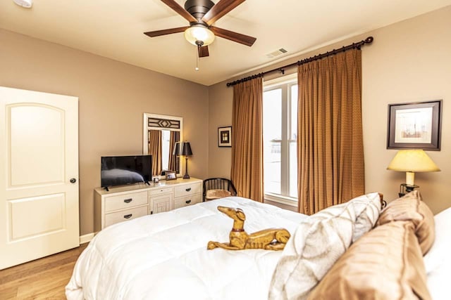 190 Links View Dr, Oakland, TN 38060 - bedroom with light wood-style floors and a ceiling fan