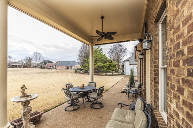 190 Links View Dr, Oakland, TN 38060 - view of patio featuring a ceiling fan and a residential view