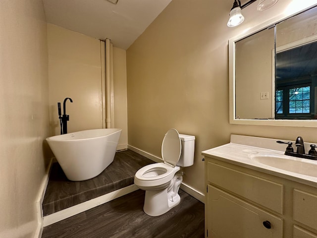1790 Country Club Rd, Somerville, TN 38068 - full bathroom featuring a freestanding tub, lofted ceiling, wood finished floors, and vanity
