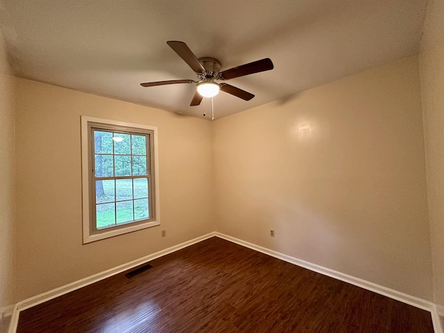 1790 Country Club Rd, Somerville, TN 38068 - unfurnished room with dark wood-style flooring and a ceiling fan