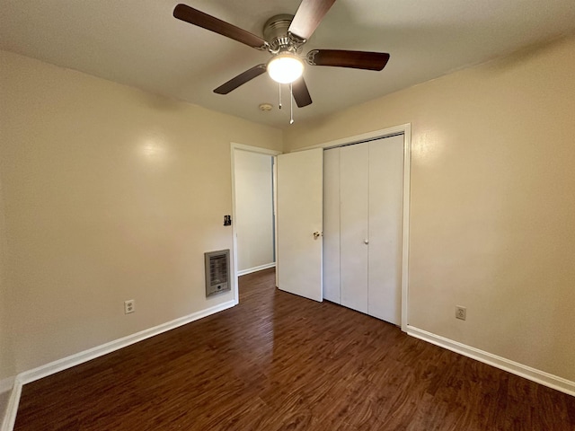 1790 Country Club Rd, Somerville, TN 38068 - unfurnished bedroom featuring dark wood finished floors, a closet, and a ceiling fan