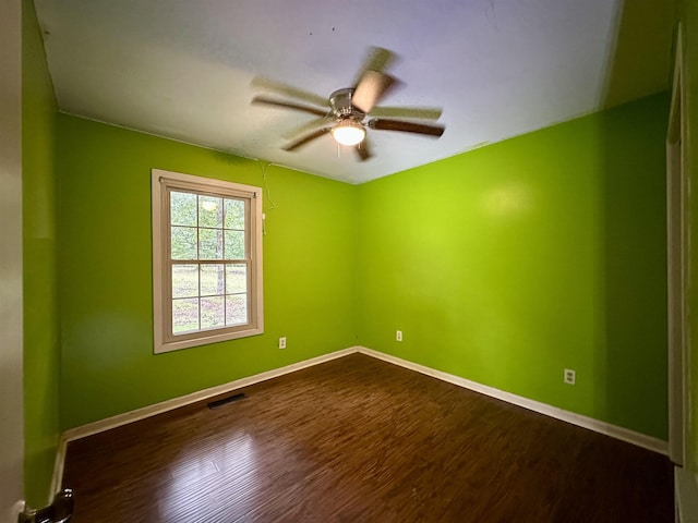 1790 Country Club Rd, Somerville, TN 38068 - empty room featuring a ceiling fan and dark wood-style flooring
