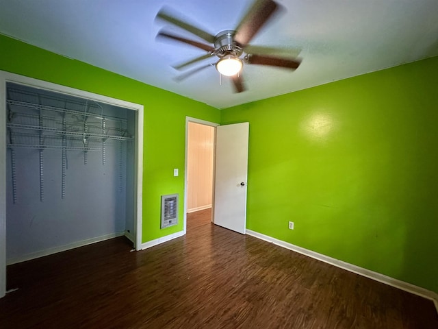 1790 Country Club Rd, Somerville, TN 38068 - unfurnished bedroom featuring dark wood-style floors, a closet, and a ceiling fan