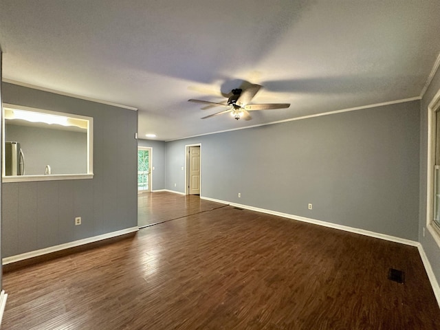 1790 Country Club Rd, Somerville, TN 38068 - spare room featuring a ceiling fan, dark wood-style floors, and crown molding