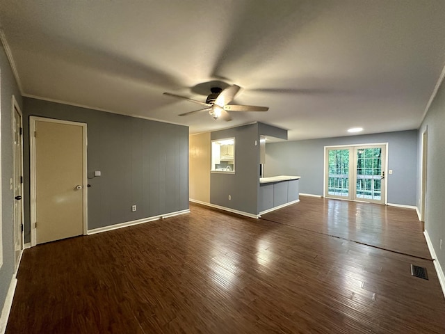 1790 Country Club Rd, Somerville, TN 38068 - unfurnished living room with ceiling fan, dark wood-style floors, and crown molding