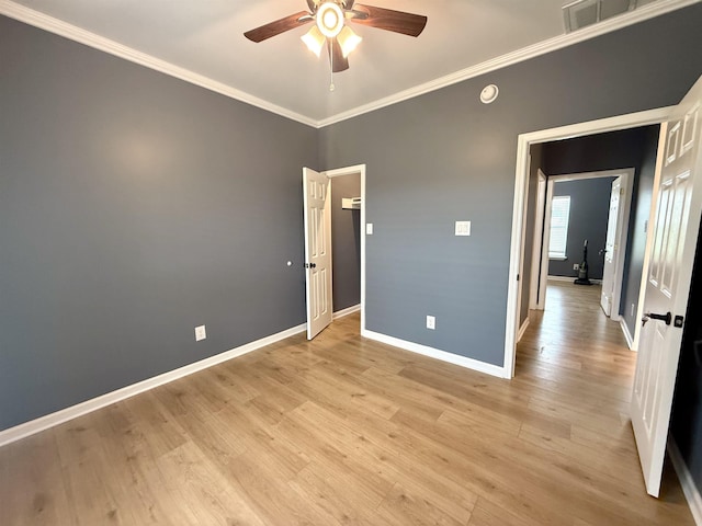 32 Foxchase Dr, Mason, TN 38049 - unfurnished room with a ceiling fan, crown molding, light wood finished floors, and a smoke detector