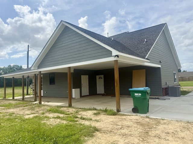 32 Foxchase Dr, Mason, TN 38049 - view of side of property featuring a shingled roof and an attached carport