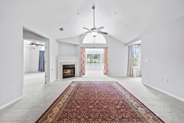 8897 Parkview Oaks Cir, Olive Branch, MS 38654 - unfurnished living room featuring carpet floors, ceiling fan, a fireplace, and high vaulted ceiling