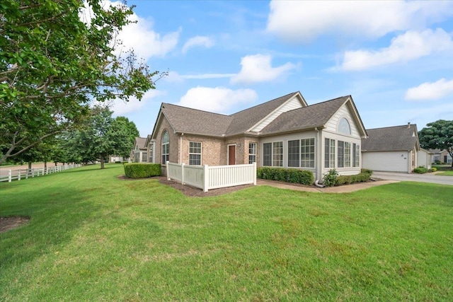 8897 Parkview Oaks Cir, Olive Branch, MS 38654 - view of property exterior featuring roof with shingles and brick siding