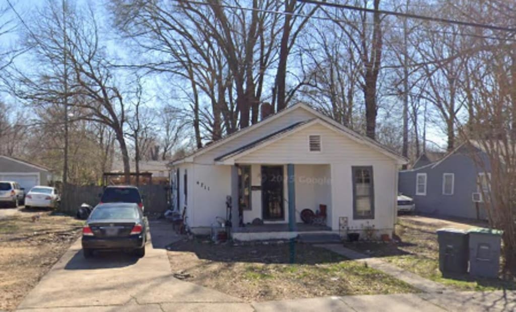 4211 Truman Ave, Memphis, TN 38108 - bungalow-style house with covered porch and driveway